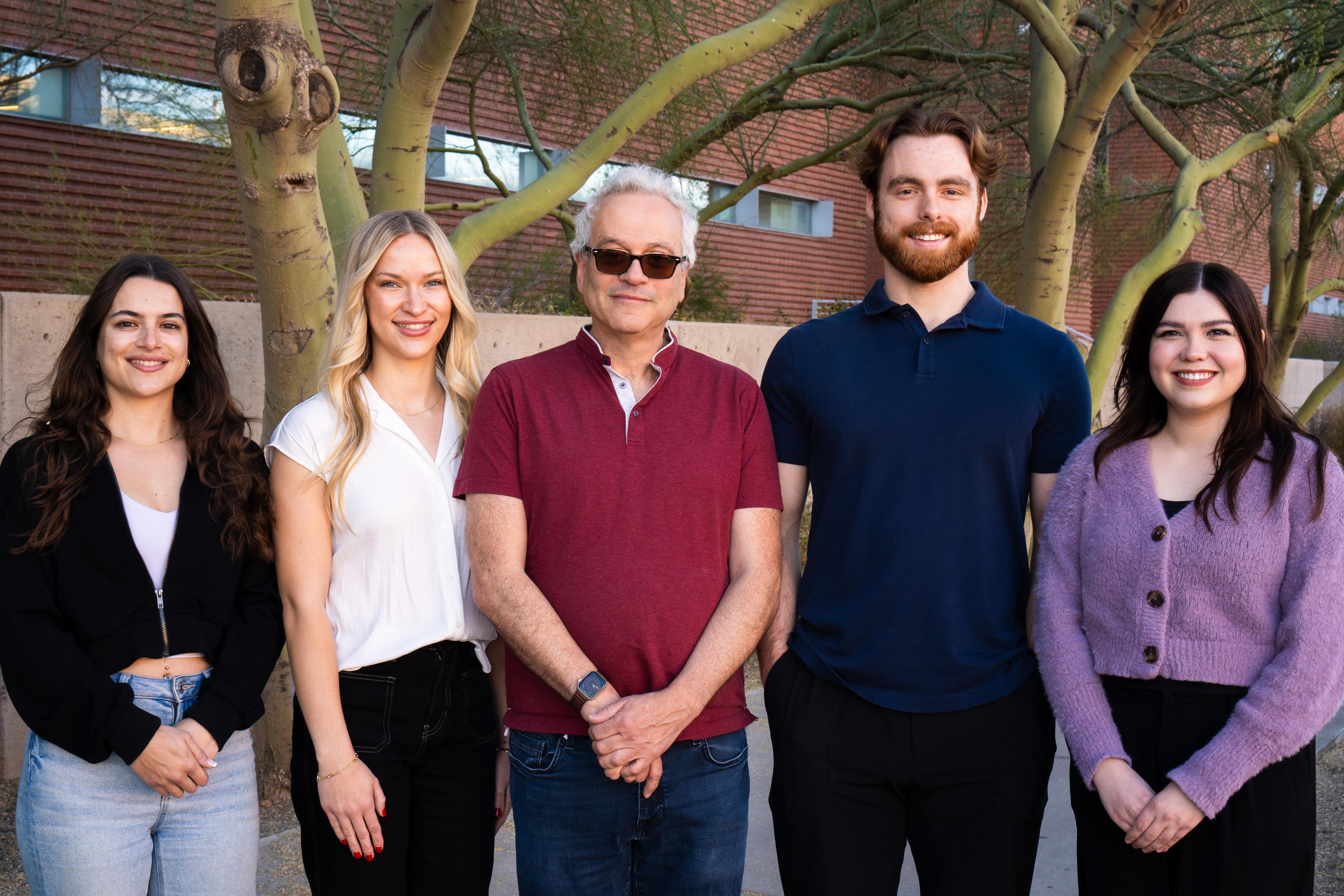 Members of Dr. Laboratory in Affective Neuroscience and Epigenetics pose for a photo.