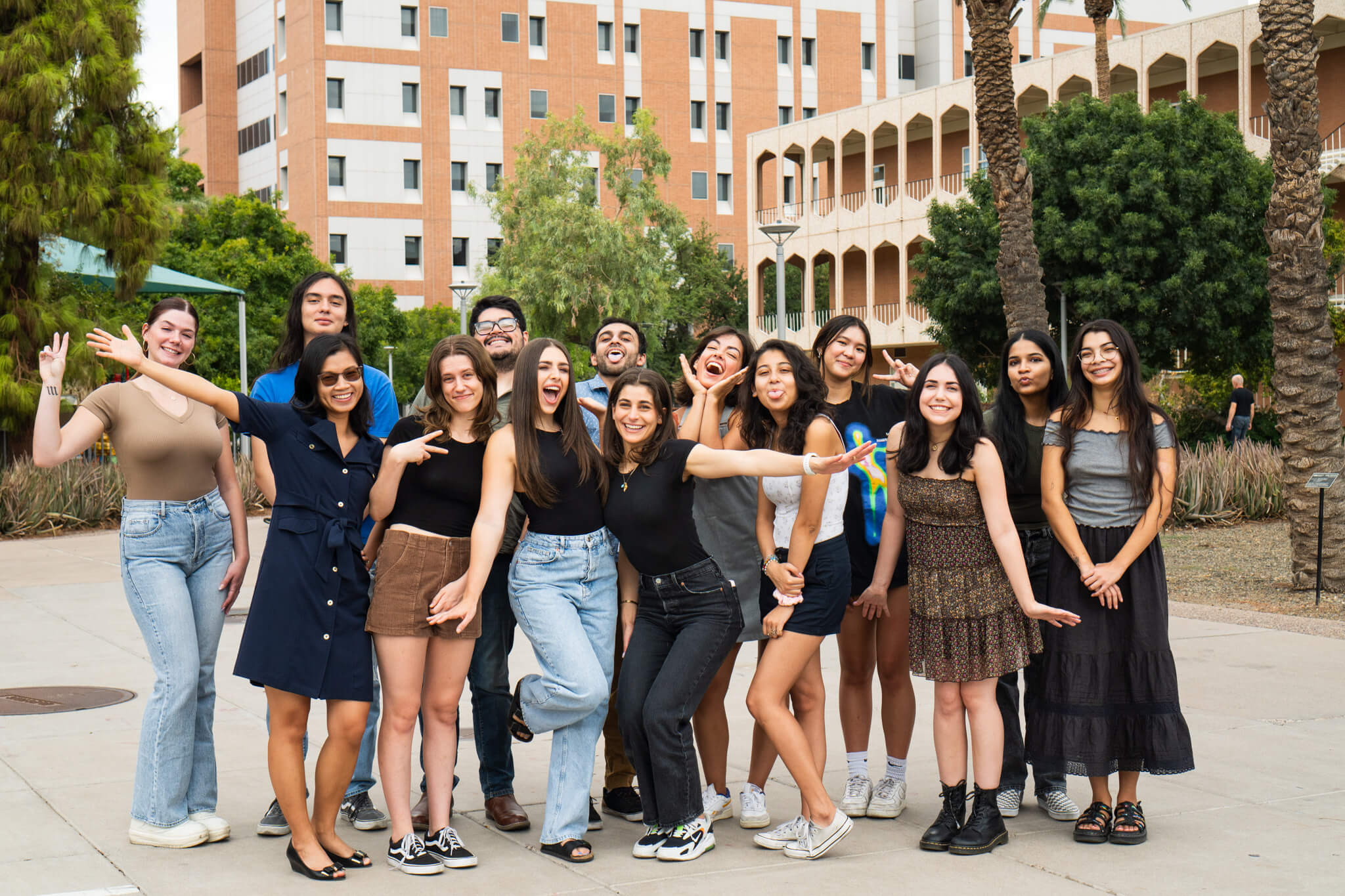 Members of the Genes, Environment, and Youth Development (Su) lab pose for a funny group photo.